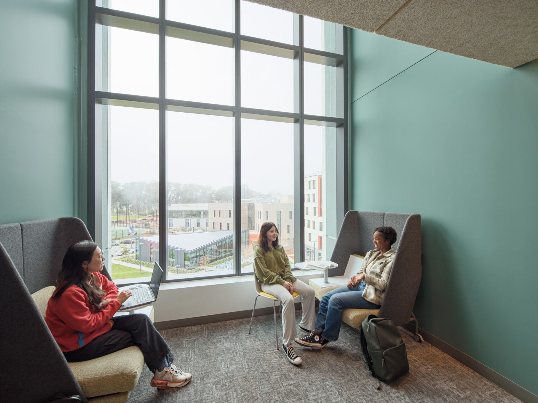 SFSU Lounge with large windows and two chairs